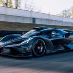 black Bugatti Bolide on road