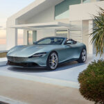 Ferrari Roma Spider sitting next to a beach house