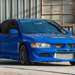 blue lancer evo VII on milestar tires