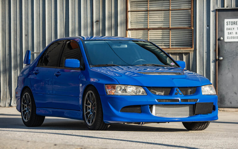 blue lancer evo VII on milestar tires