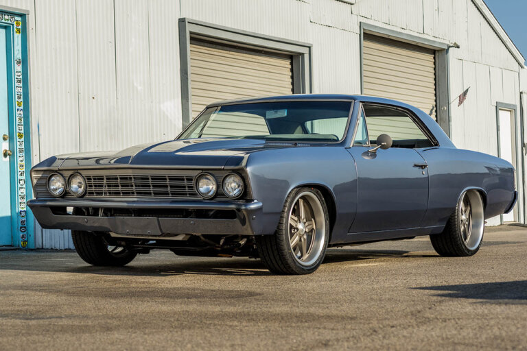 grey chevelle next to garage