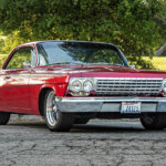 red impala bubbletop at a park