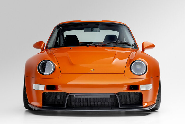 orange 911 on white background