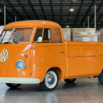 orange single cab transporter in garage