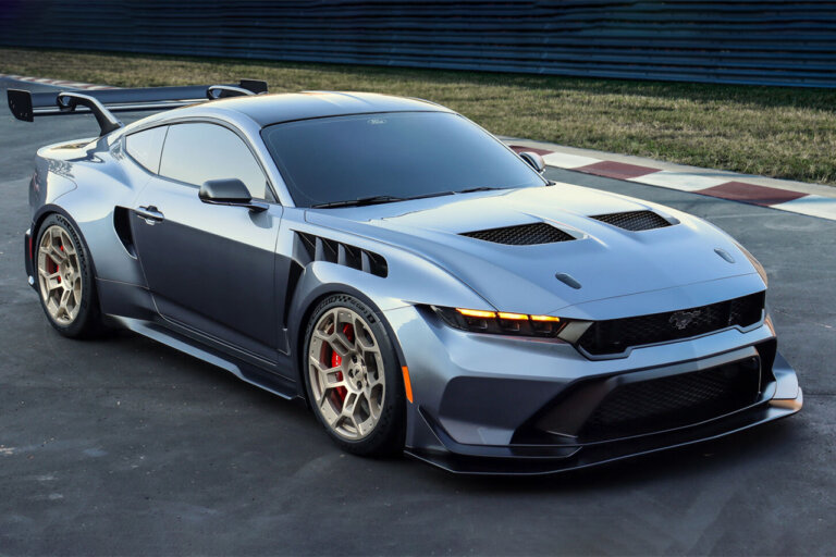 grey Mustang parked on racetrack