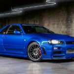 Bayside Blue Nissan Skyline GTR R34 in concrete garage and led lighting