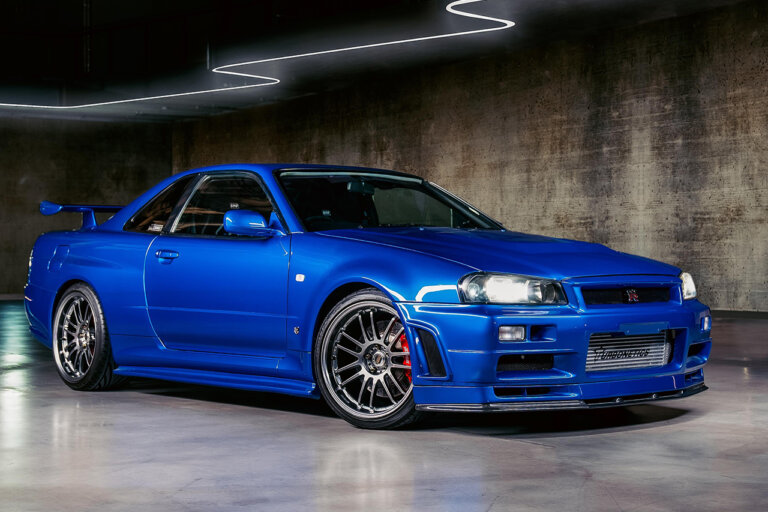 Bayside Blue Nissan Skyline GTR R34 in concrete garage and led lighting