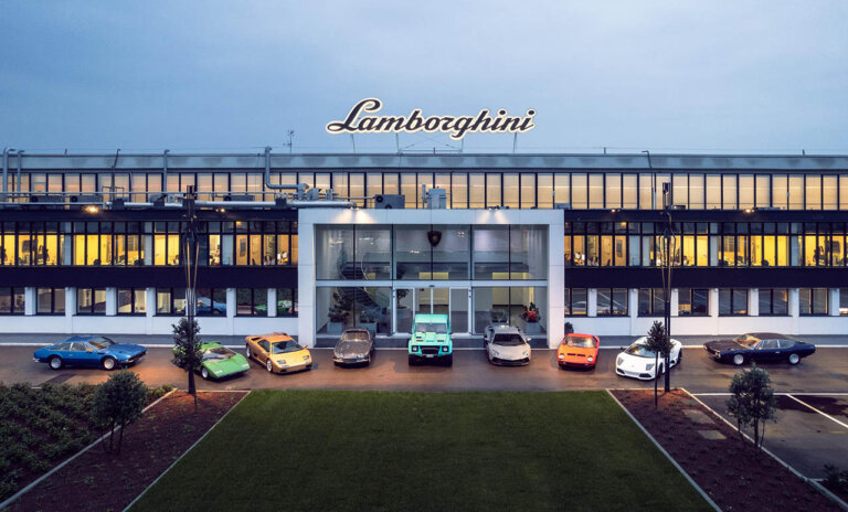 Lamborghini vehicles in front of building