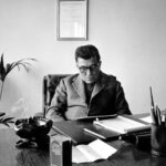 Ferruccio Lamborghini sitting in his desk
