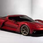 Red Bizzarrini Giotto parked over a circle and two white walls behind it