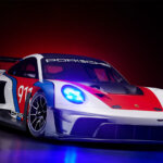 Red, white, and blue Porsche 911 GT3 R Rennsport edition Porsche on a dark background with blue and red accents