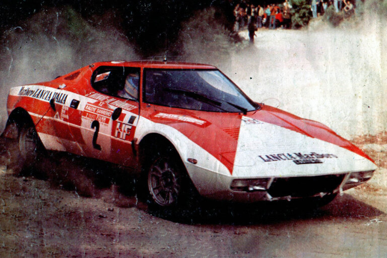 red lancia stratos rally car with marlboro livery