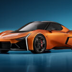 orange toyota FT-Se posed on a blue background