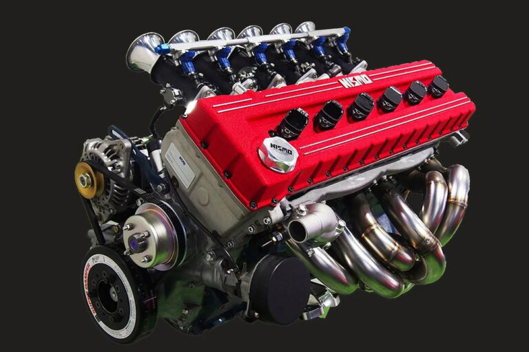 L-Engine close up with Nismo DOHC upgrade, engine is displayed with black background